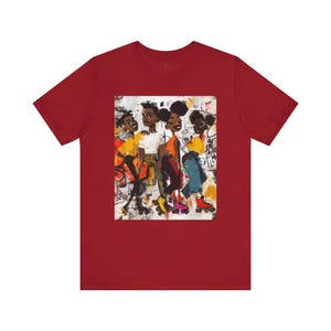 Abstract graffiti-style cartoon illustration of Black roller skaters dancing and skating at a roller rink, featuring vibrant colors, urban street art influences, and Afrocentric cultural themes on a unisex graphic tee shirt.