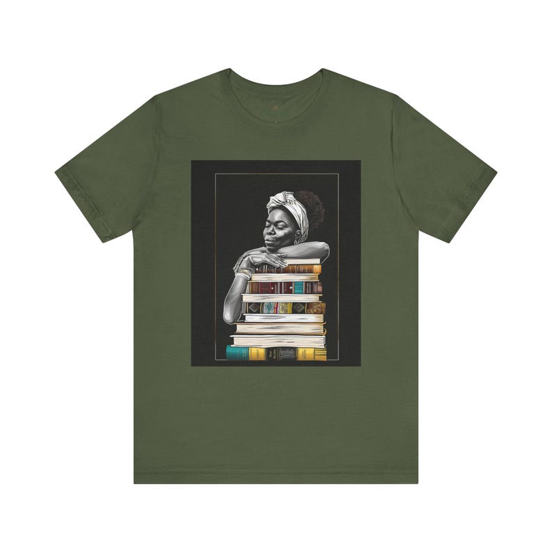 Afrocentric graphic tee shirt featuring a peaceful Black woman embracing a stack of books, symbolizing education, knowledge, freedom, and generational legacy.