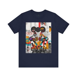 Black Girl Roller Skaters Tee Shirt featuring abstract graffiti pop art of African American women roller skating in bold, bright colors; Afrocentric fly girls streetwear.
