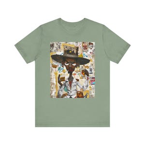 Black Cowboy Tee featuring a cartoon-style African American cowboy smoking a cigarette and drinking whiskey. A bold, graffiti collage pop art design with an edgy Western and Afrocentric cultural vibe.