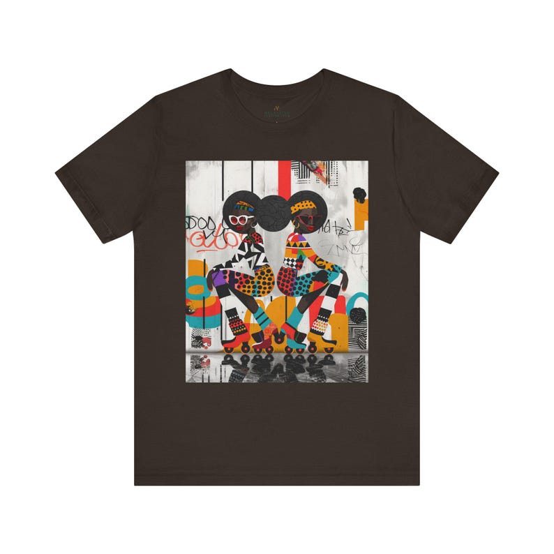 Black Girl Roller Skaters Tee Shirt featuring abstract graffiti pop art of African American women roller skating in bold, bright colors; Afrocentric fly girls streetwear.
