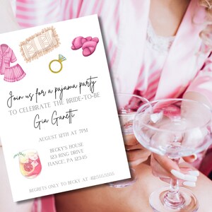 May include: A white invitation for a pajama party, featuring watercolor illustrations of pajamas, slippers, a ring, and a cocktail. The invitation text reads "Join us for a pajama party to celebrate the bride-to-be Gia Ganett".