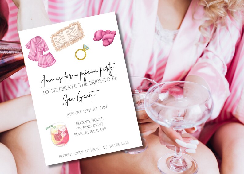 May include: A white invitation for a pajama party, featuring watercolor illustrations of pajamas, slippers, a ring, and a cocktail. The invitation text reads "Join us for a pajama party to celebrate the bride-to-be Gia Ganett".