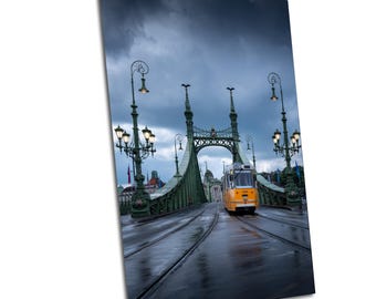Liberty Bridge in Budapest Under Moody Skies with lone tram crossing Canvas Wall Art Photo gift Print Wall Decor Home Office Decor