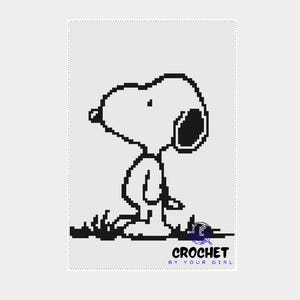 May include: Black and white pixelated image of Snoopy, a cartoon dog, sitting on grass. The image is a crochet pattern. The text "CROCHET BY YOUR GIRL" is at the bottom.