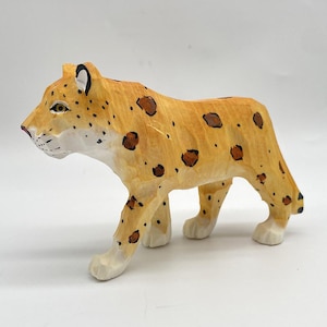 Handcarved Basswood Leopard Figurine: Nature-Inspired Office Decor