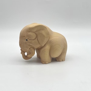 Hand Carved Boxwood Elephant Figurine: Miniature Wood Sculpture