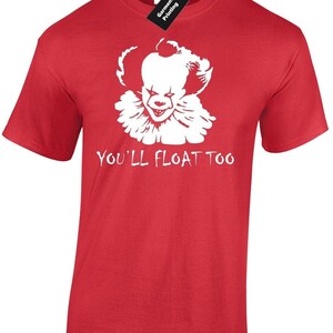 May include: Red t-shirt featuring a white silhouette of a clown with the text "You'll Float Too" printed on the front.