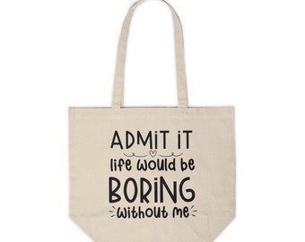 Może przedstawiać: Beżowa torba typu tote z czarnym tekstem, który brzmi "ADMIT IT life would be BORING without me".