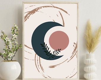 Könnte beinhalten: Ein gerahmter Druck mit einem minimalistischen Design, das einen Halbmond in Dunkelblau, einen rosa Kreis und grüne Blätter auf weißem Hintergrund mit braunen Pinselstrichen zeigt.