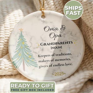 May include: A round, white marble-patterned ornament with a Christmas tree illustration and the words "Oma & Opa GRANDPARENTS" and "Keepers of traditions, makers of memories, givers of endless love." The year "2025" is also included.