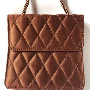 Vintage gewatteerde avondtas