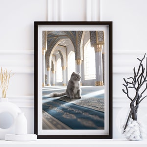 A short-haired blue cat sitting on a blue prayer mat in a white and gold mosque wall art, Wall art of a cat on a prayer mat, Islam