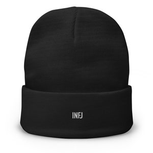 May include: Black knit beanie with a white embroidered "INFJ" on the front.