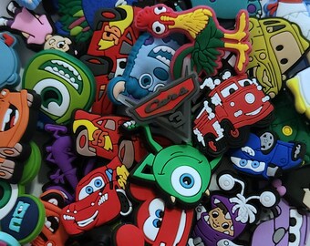 DIS. ANIMATED Croc Charms (Post 5/11) | Monsters Inc | Cars | Moana | Mike Wazowski | Sully | Boo | Lighting McQueen | Mater | Pua | Hei Hei