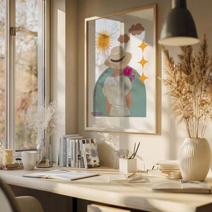 Puede incluir: Una ilustración enmarcada de una persona con un sombrero y una camisa blanca, de pie frente a un fondo azul y verde con un sol, nubes y estrellas. El texto "The best of today is yours" está escrito en el lado izquierdo de la imagen.