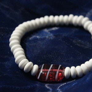 Handmade candy-themed clay stretch bracelet.