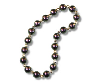 Regal Radiance: Purple crystal pearls elastic bracelet