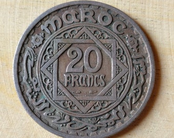 Rara moneda de cincuenta francos de Marruecos 1366