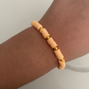 Preppy orange and gold bracelet