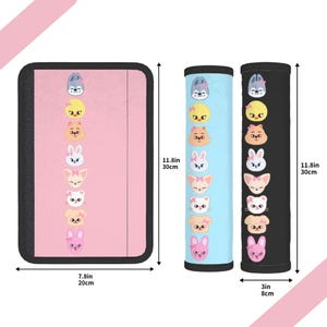 May include: A set of three items: a pink rectangular pad (7.8in x 11.8in), and two cylindrical items (3in x 11.8in). Each item features a repeating pattern of cartoon animal faces in various colors, including blue, yellow, white, and pink.