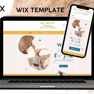 May include: A laptop computer displaying a website with the text "My Secret Place" and a photo of a woman in a straw hat sitting on a beach. The website has a yellow and pink color scheme and features a button that says "Shop Now".