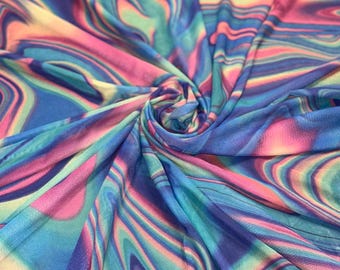 May include: A blue, pink and green swirl patterned mesh fabric. The fabric is sheer and has a soft, flowing texture.