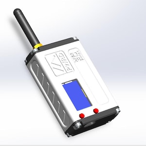May include: A white and black electronic device with a black antenna, a blue screen, and two red buttons. The device has the text "PYRD" and other symbols on its surface. The device is rectangular with rounded edges.