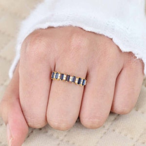 Glowing blue sapphire and diamond eternity ring, exuding luxury and charm.
Brilliant natural sapphire diamond eternity ring, a true showstopper.
Enchanting blue sapphire and diamond eternity ring, evoking feelings of romance and passion.