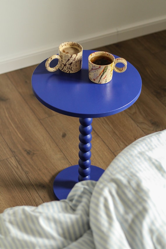 Single leg coffee table discount