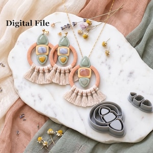 May include: Boho-style jewelry set featuring earrings, a necklace, and stud earrings. The earrings and necklace have a peach-colored ring with a green, blue, and yellow stone design, and a beige tassel. The image also includes the text "Digital File".