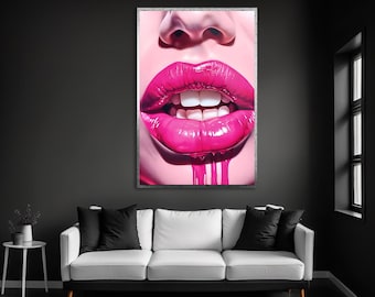 May include: A rectangular wall art print featuring a close-up of glossy, vibrant pink lips with white teeth slightly parted. The lower lip has thick, viscous pink liquid dripping downward. The artwork is framed in a thin, metallic silver border.