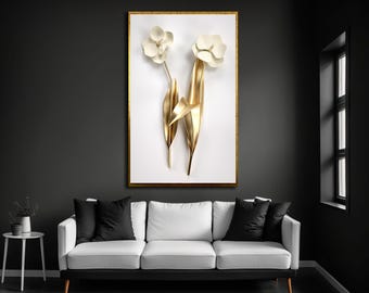 Puede incluir: Una pieza de arte mural rectangular que presenta dos flores blancas tridimensionales con tallos y hojas de metal dorado, sobre un fondo blanco y encerrada en un marco dorado fino, creando una exhibición floral escultórica.
