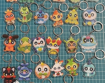 Keychains - Initial Pkmn from First to Ninth Generation (Kanto, Johto, Hoenn, Sinnoh, Unova/Unova, Kalos, Alola, Galar and Paldea)
