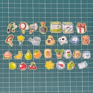 Adesivi di Animal Crossing. Oggetti, Attrezzi (Canna da pesca, Pala, Fionda, Retino), Frutta (Pesca, Cocco, Ciliegie, Mela...)