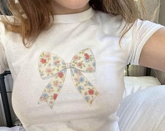 コケットシャツ ヴィンテージ BPW プリント グラフィック ベビーTシャツ レディース リボン 2000年代 レディース 服