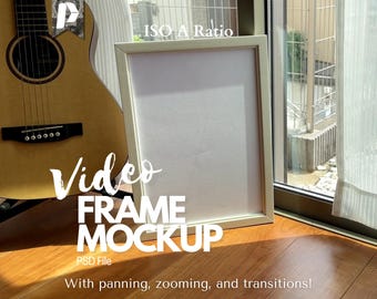 May include: A white picture frame mockup with a wooden guitar in the foreground. The frame is on a wooden floor with a window and white curtains in the background. The text "ISO A Ratio" is at the top of the frame and the text "Video FRAME MOCKUP" is below the frame. The text "PSD File" is below the frame and the text "With panning, zooming, and transitions!" is at the bottom of the image.