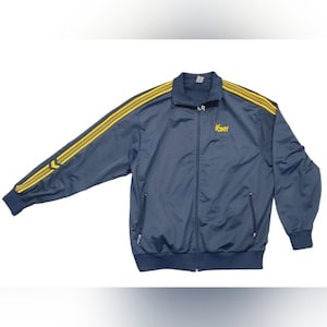 May include: A navy blue track jacket with yellow stripes and the word "Pony" embroidered on the chest.