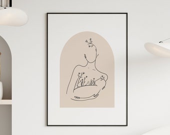 May include: A minimalist living room interior with two white armchairs, a black framed print of a line drawing of a woman holding a baby, and three white cloud-shaped pendant lights.