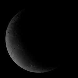 Puede incluir: Una luna creciente en un cielo nocturno oscuro.