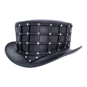 May include: A black leather top hat with a grid pattern and silver studs.