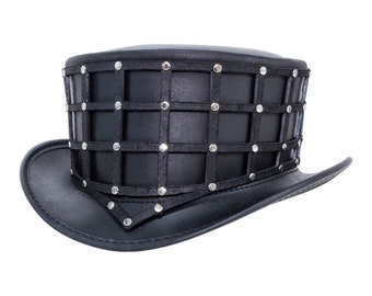 May include: A black leather top hat with a grid pattern and silver studs.