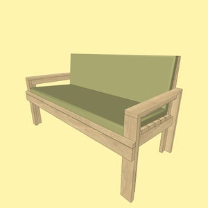 Puede incluir: Un banco de madera con un acabado marrón claro y un cojín verde. El banco tiene un diseño sencillo con líneas rectas y una forma rectangular.
