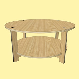 Könnte beinhalten: Ein runder Holz-Couchtisch mit einem unteren Regal. Der Tisch ist aus hellem Holz und hat ein schlichtes Design.