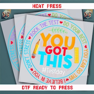 May include: DTF ready to press heat transfer with the text "YOU GOT THIS" in orange, red, and blue. A yellow pencil and ruler are included in the design. The design also includes the text "DON'T STRESS, ROCK THE TEST, DO YOUR BEST, I BELIEVE IN YOU".