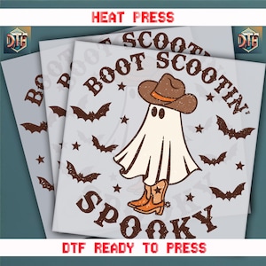 May include: DTF ready to press transfer featuring a ghost wearing a cowboy hat and boots, with the words "Boot Scootin' Spooky". The design includes brown bats and stars, perfect for Halloween.