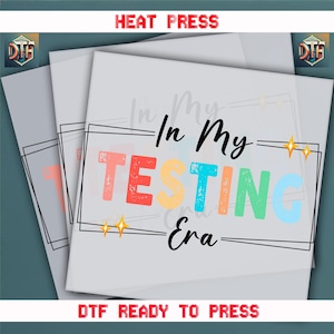 a stack of papers with the words in my testing era on them