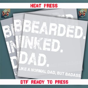 a pile of papers with the words bebearded, inked, dad