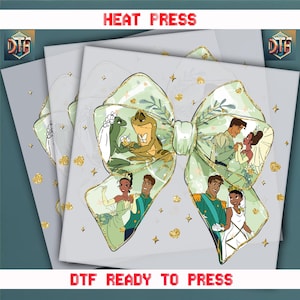 May include: A green and gold glitter bow with images of a frog prince and princess, a human prince and princess, and a human prince and princess in a green and gold glitter bow. The text "DT READY TO PRESS" is at the bottom of the image.