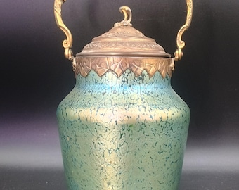 Magnificent iridescent green glass biscuit tin by Loetz, circa 1900, Art Nouveau